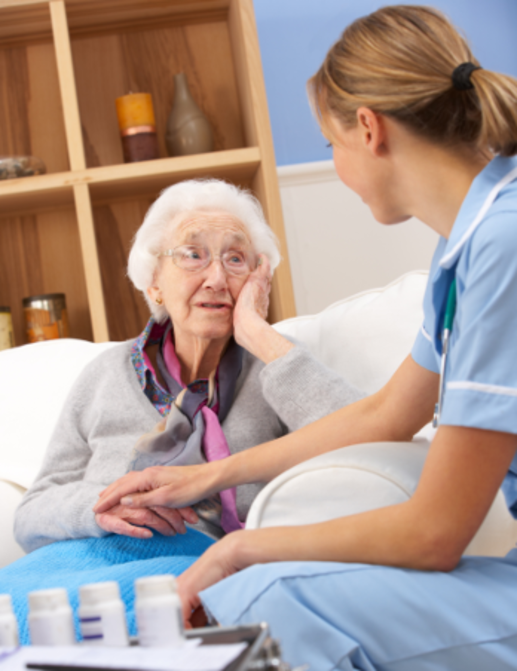 Older adult talking with a healthcare provider.