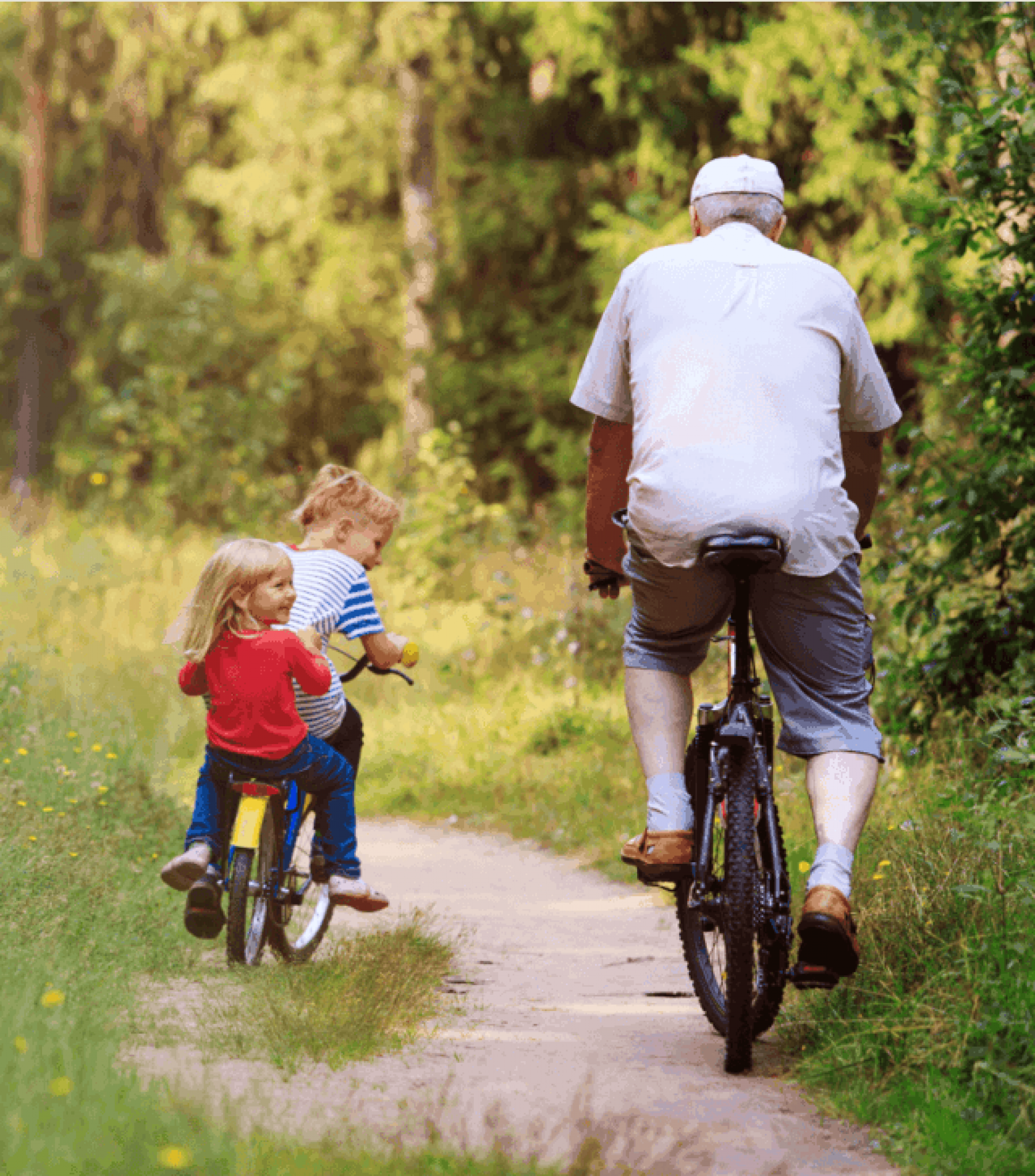 Grandfather and two grandchildren out for a bike ride.