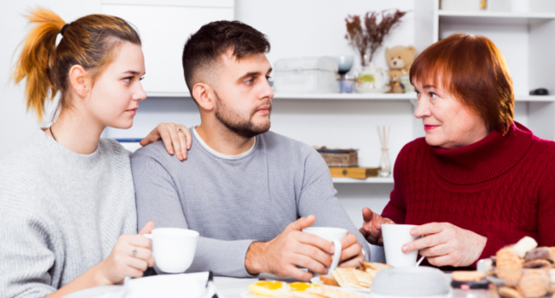 Mother having a serious conversation with her adult children.